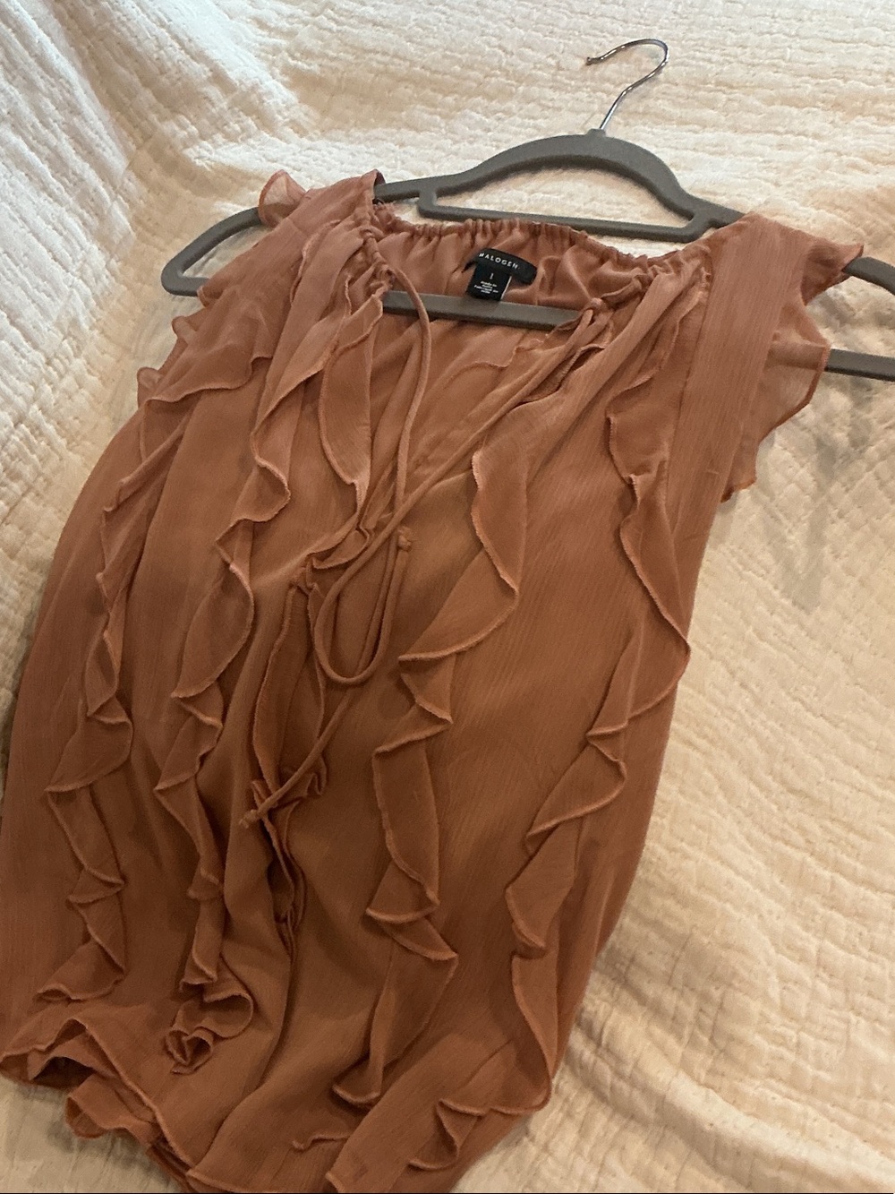 Sleeveless Ruffle Blouse - Picture 1 of 3